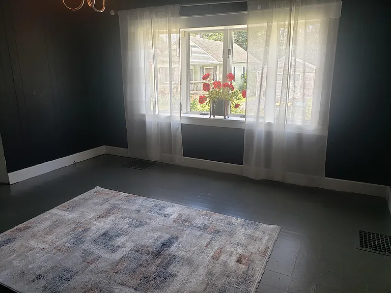Dining Room off Kitchen with Bow Window.