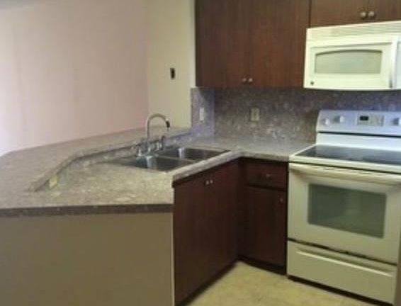 4th image of 8550 N Sherman Cir #C210