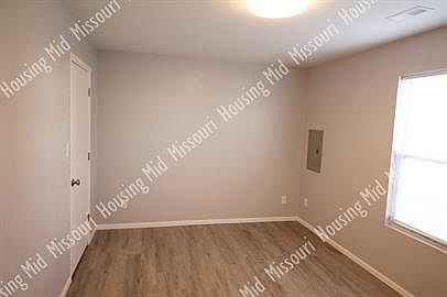 The main bedroom is downstairs and has a walk-in closet.