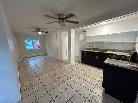 Kitchen and living room from breakfast area