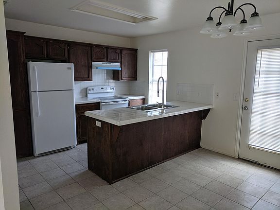 Kitchen with eat-in dining area.