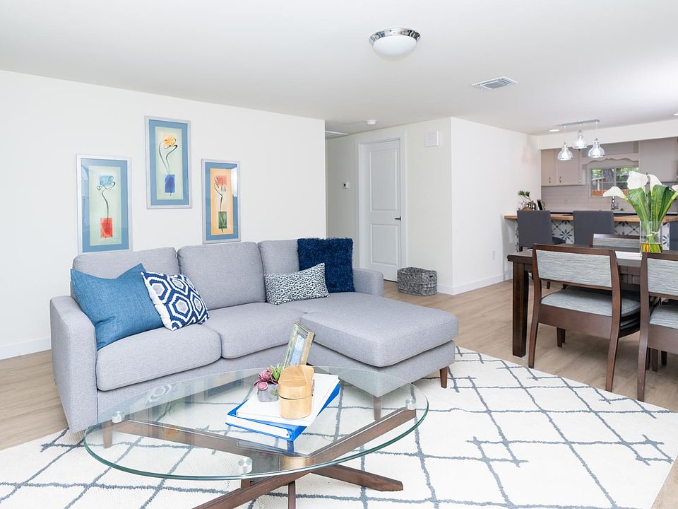 living area to bedrooms and kitchen in back