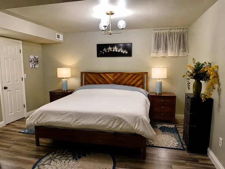 Downstairs king bedroom with walk in closet. Includes TV and Roku for streaming.