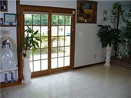 family room- new tile through out & fireplace