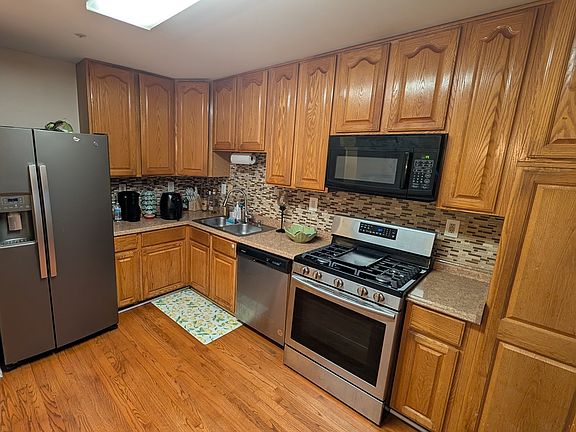 Upgraded gas stove and new refrigerator