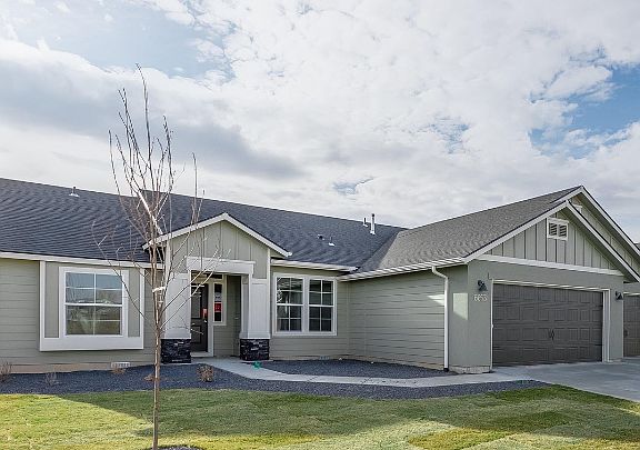 MLS photo showing three car garage