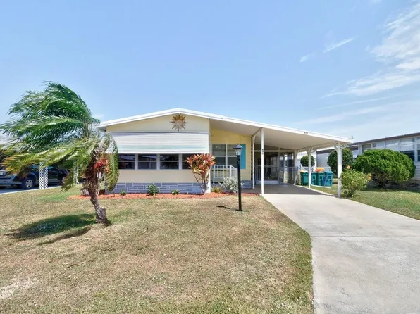 936 Frangi Pani Dr, Barefoot Bay, FL 32976