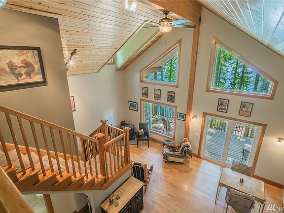 Open living space with Cedar tongue and groove on the ceiling. 