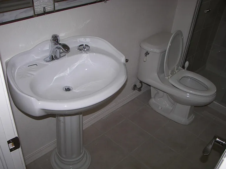 3rd bathroom main floor, from entry door, tiled shower in ba
