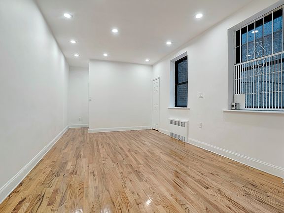 3rd image of 185 E 3rd St APT 4G