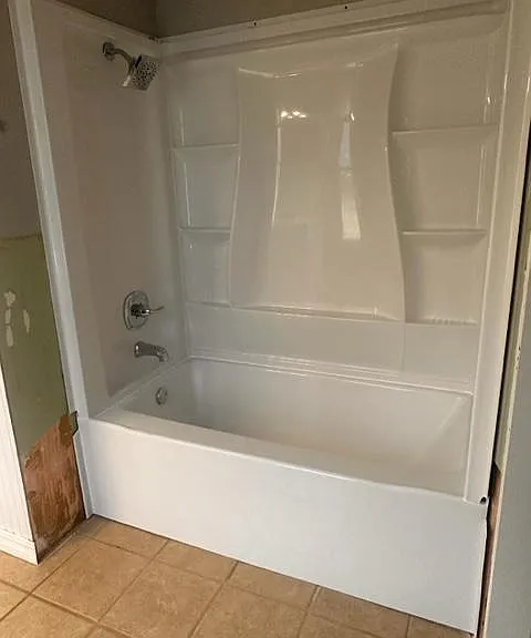 New tub and shower surround and fixtures almost completed.