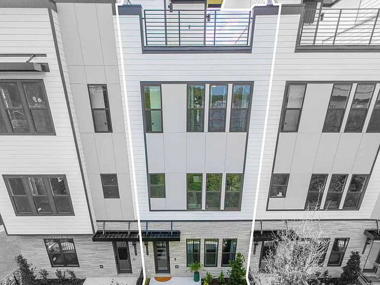 Front of house with fenced entrance