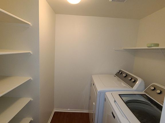 Laundry room. Washer and dryer included.