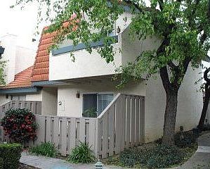 Front of unit with fenced patio