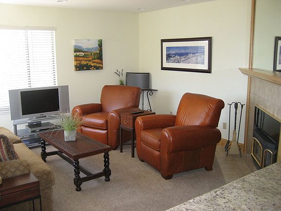 Plush living room w/Gas Log Stove.  Fully furnished!