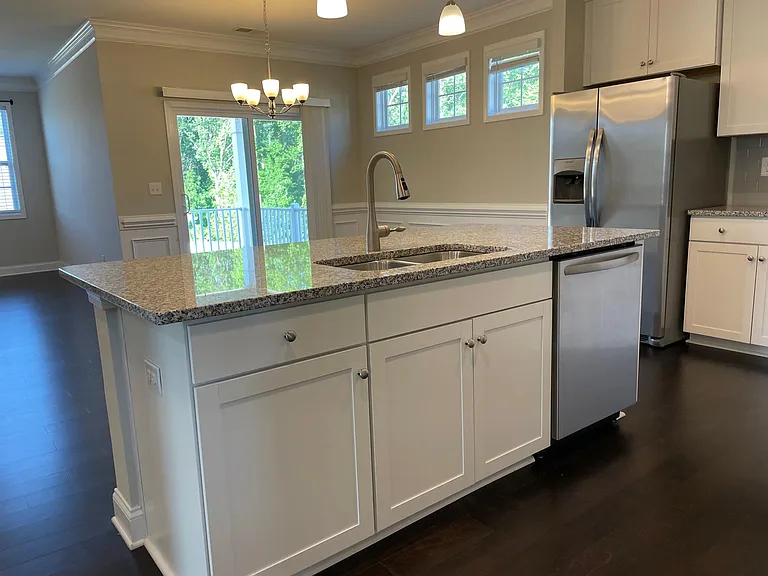 Kitchen open to dining area and family room.