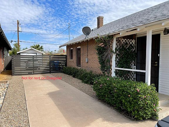 Driveway and gate to backyard