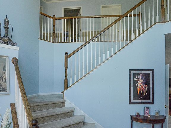 Foyer and Waterfall Staircase