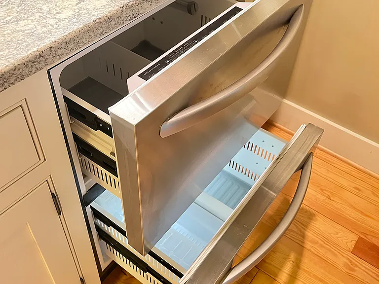 Two-drawer stainless refrigerator/freezer.