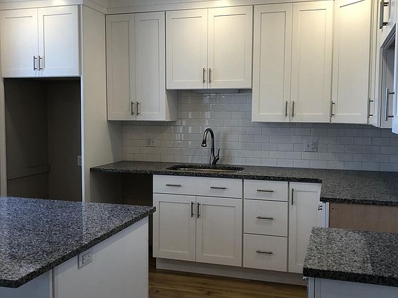 Amish-made cabinetry and granite counters