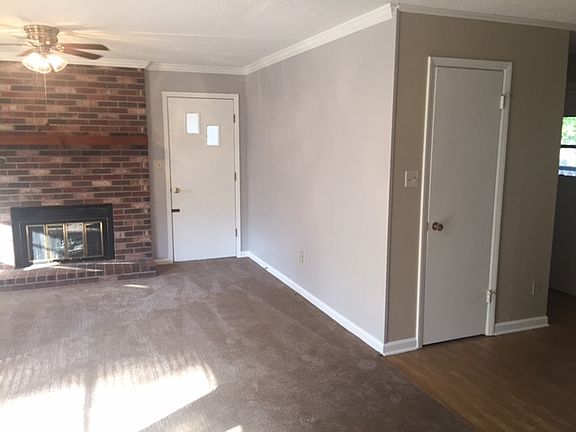 LR fireplace and 3rd door