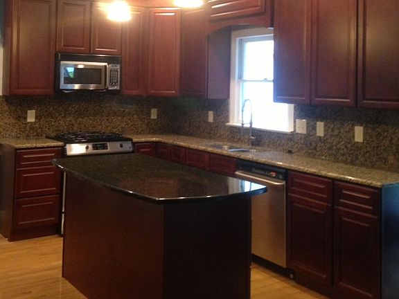 Cherry cabinets/granite