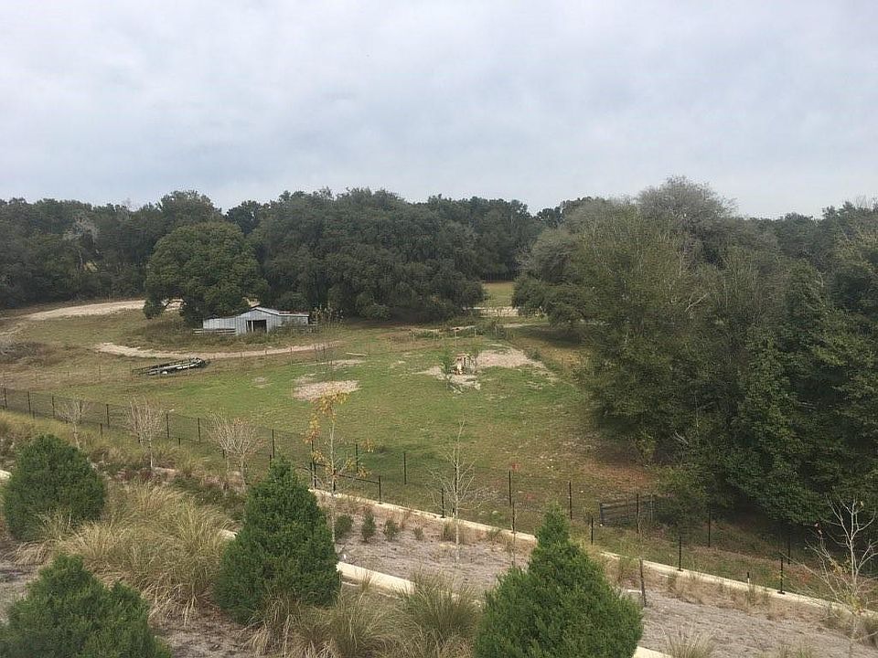 view of pastures and barn