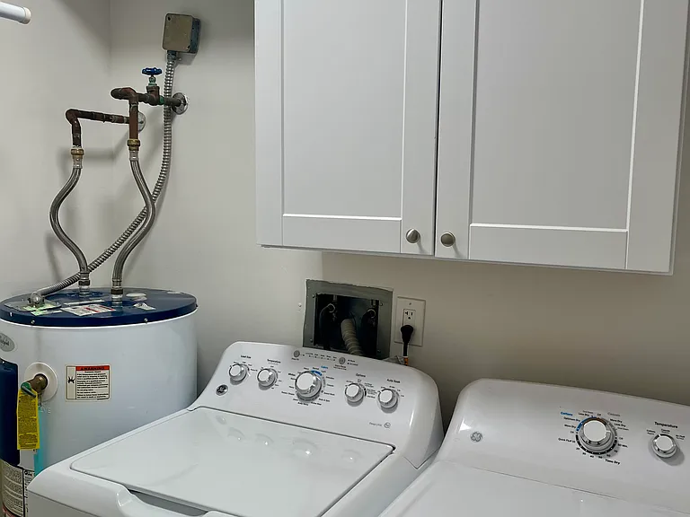 Pretty Laundry Room with Newer Washer/Dryer
