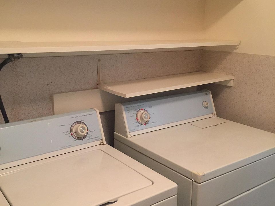 Laundry room  by family room