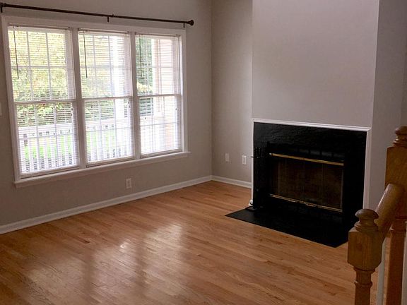 Living room with vaulted ceilings.