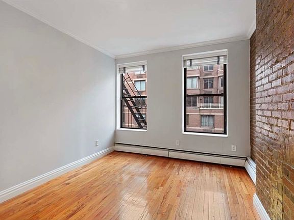 5th image of 344 W 49th St APT 3C