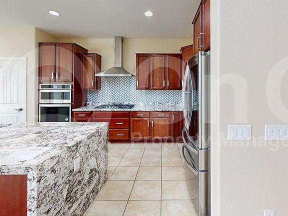 4th image of 8943 W Marshall Ave