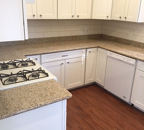 Remodeled Kitchen with canister lights