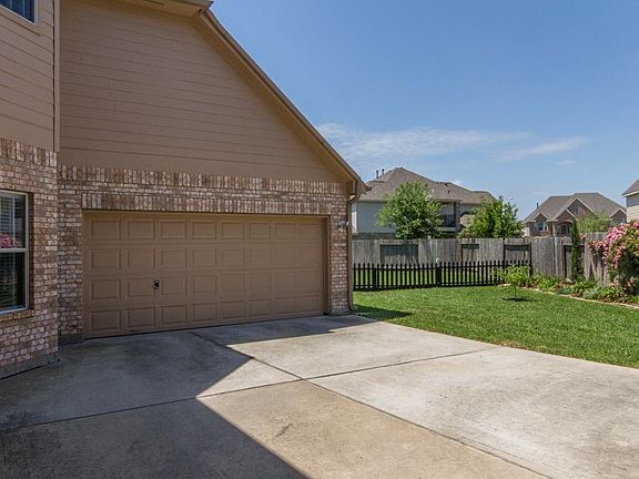 Attached 2 car garage in rear