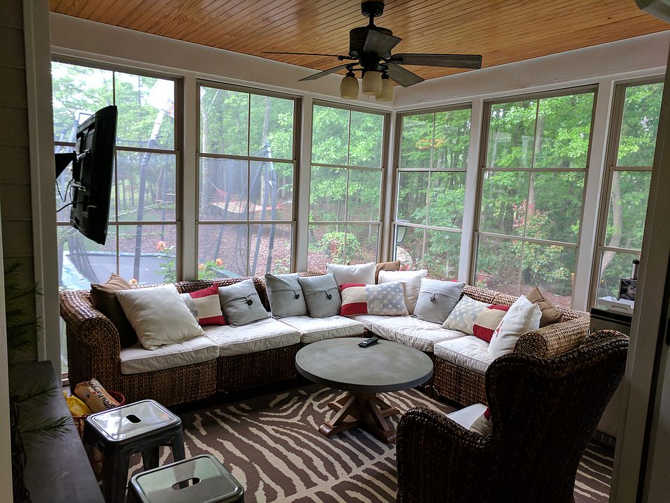 screened porch with windows