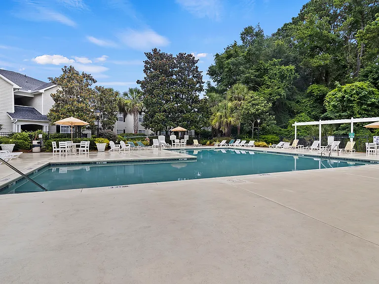 Pool with lounge chairs and seating