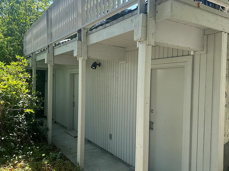 Storage rooms with parking above