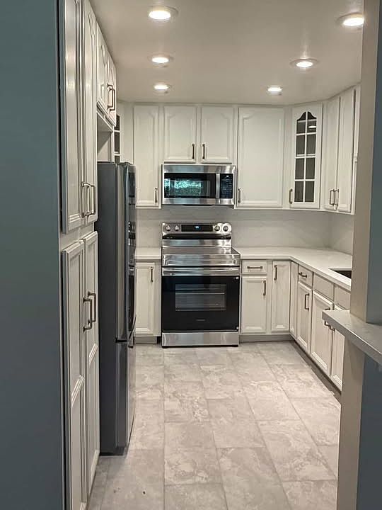 New Renovated Kitchen & all new appliances. New flooring, countertop, sink, fridge, oven, dishwasher and hardware. More pictures to come!
