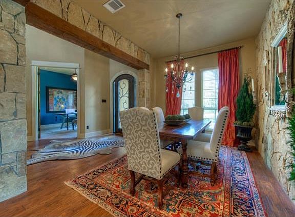 Throughout the home you will find stone and wood beam accents adding nice architectural interest to the home.