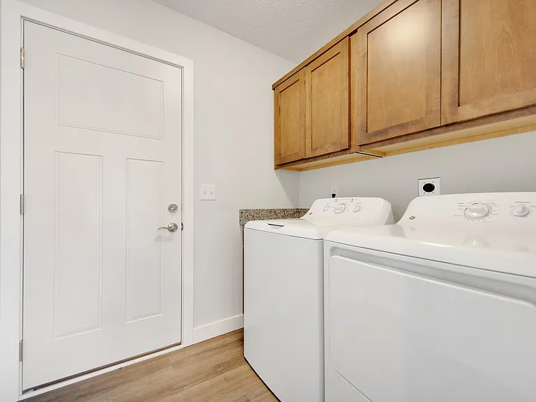Main Floor Laundry Off Garage.