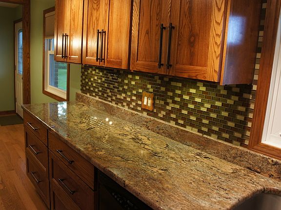 Solid wood floor, custom solid wood cabinets, granite countertop