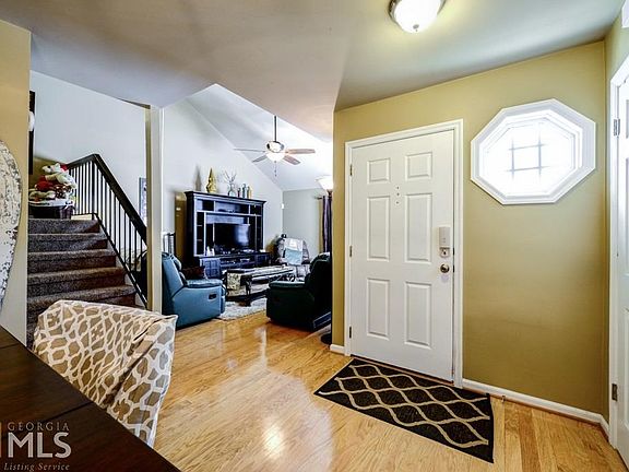 High ceilings, gleaming hardwoods and neutral colors are the backdrop for your furniture and artwork