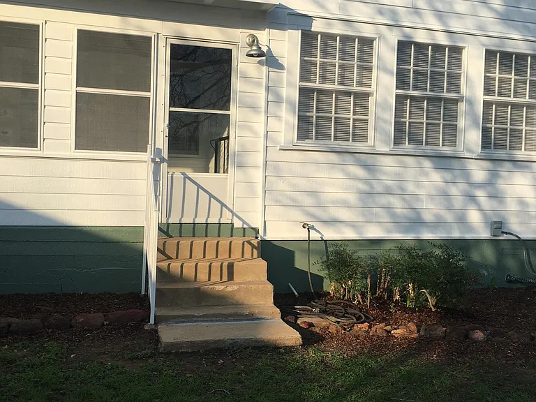 back door of house to sunroom