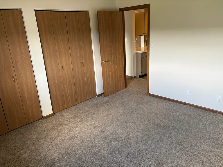 Bedroom with large double closet