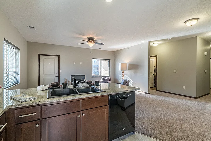 Our open-concept layouts make entertaining effortless, blending kitchen and living spaces for a warm, inviting atmosphere.