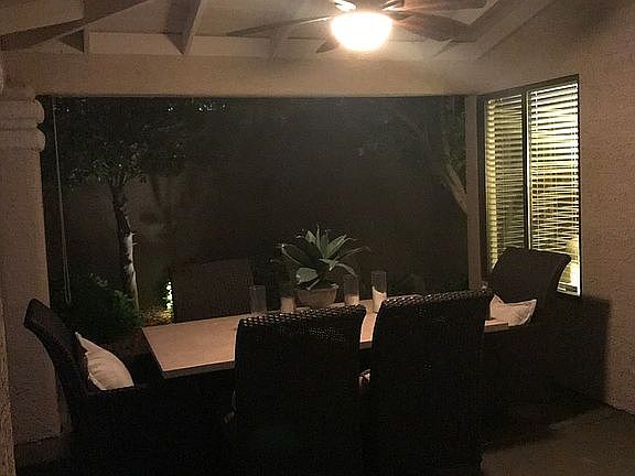 Covered patio with 2 fans