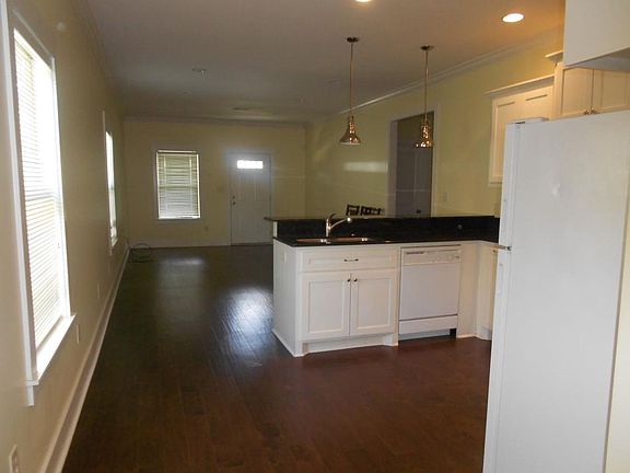 Long view of livingroom and kitchen