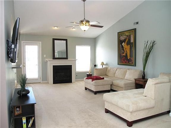 Great Room: Large Great Room with Cathedral Ceilings & Fireplace. 
