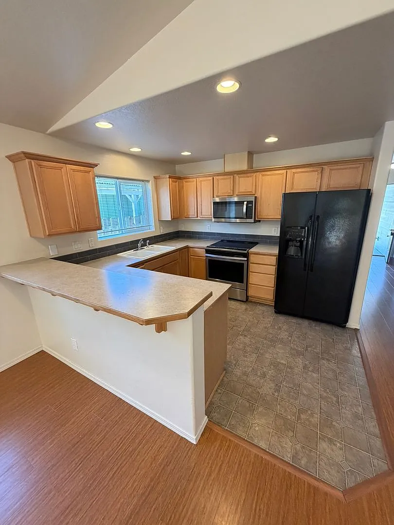 **Move In Special** 4 Bedroom Pet Friendly Home Near Timber Ridge School! — Photo 3