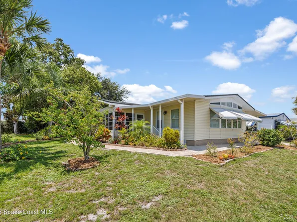 727 Periwinkle Cir, Barefoot Bay, FL 32976